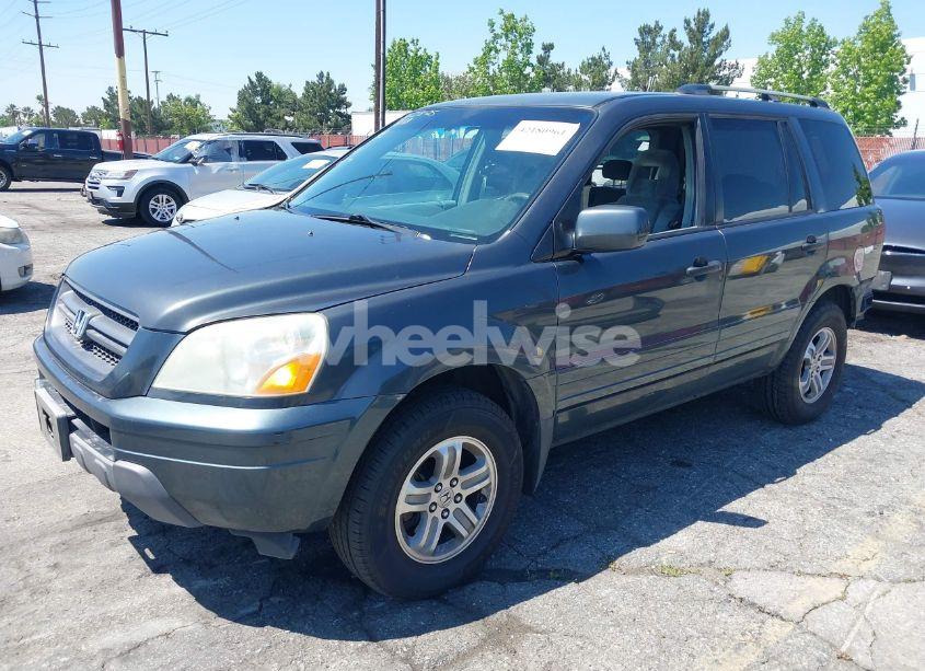 Photo 2 of 2005 Honda Pilot EX (VIN 2HKYF18495H542707)