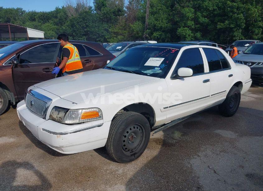 Photo 2 of 2005 Mercury Grand MARQUIS GS (VIN 2MEFM74W05X644708)