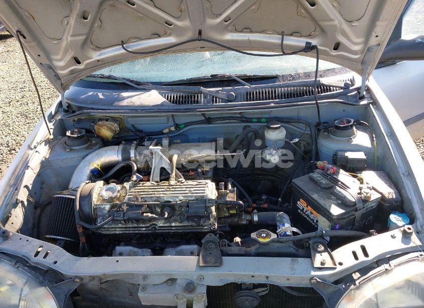 Photo 10 of 1999 Suzuki Swift N/A (VIN 2S2AB21H9X6600313)