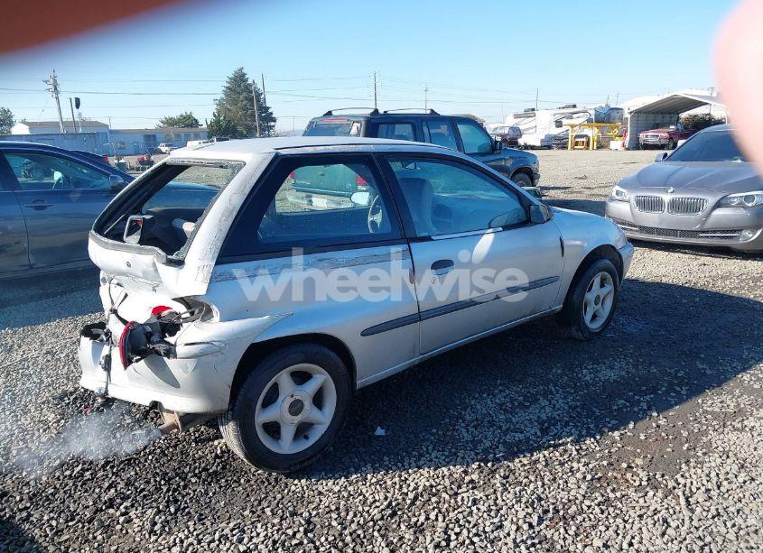 Photo 4 of 1999 Suzuki Swift N/A (VIN 2S2AB21H9X6600313)