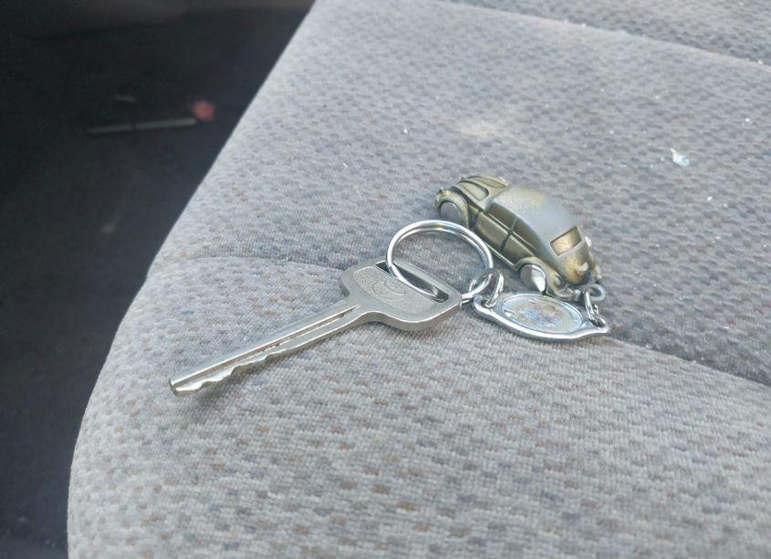 Photo 11 of 2002 Toyota Corolla LE (VIN 2T1BR12E02C569890)