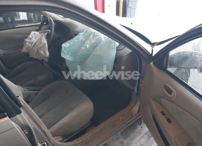 Photo 5 of 1999 Toyota Corolla LE (VIN 2T1BR12E5XC144348)