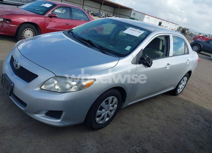 Photo 2 of 2010 Toyota Corolla LE (VIN 2T1BU4EE2AC398621)