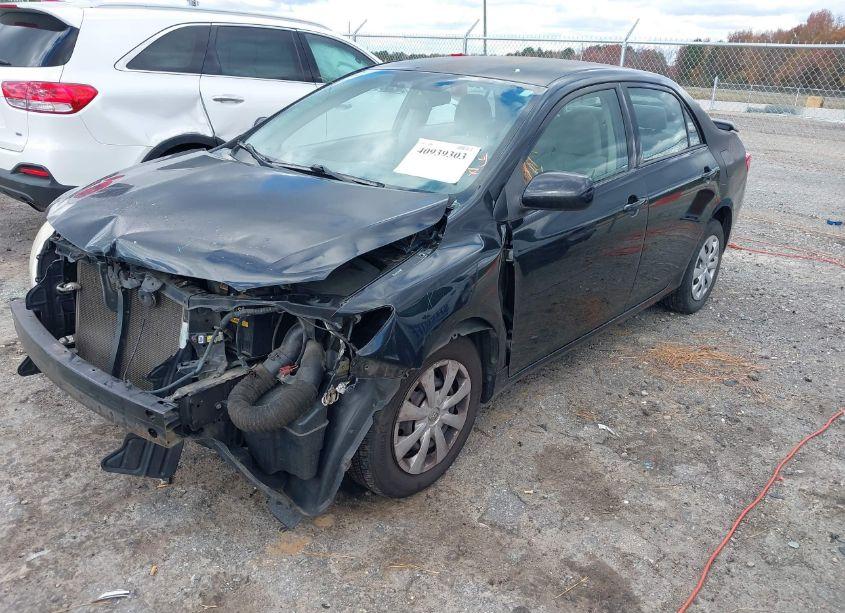 Photo 2 of 2010 Toyota Corolla LE (VIN 2T1BU4EE3AC371749)