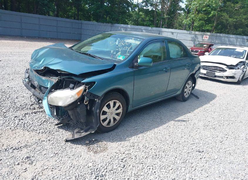 Photo 2 of 2010 Toyota Corolla LE (VIN 2T1BU4EE5AC324819)