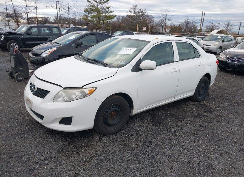 Photo 2 of 2010 Toyota Corolla LE (VIN 2T1BU4EE9AC531679)