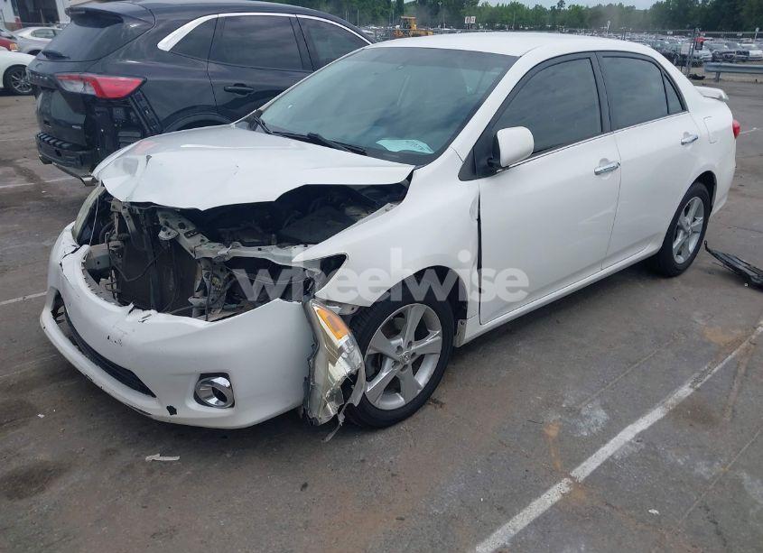 Photo 2 of 2013 Toyota Corolla LE (VIN 2T1BU4EE9DC975682)