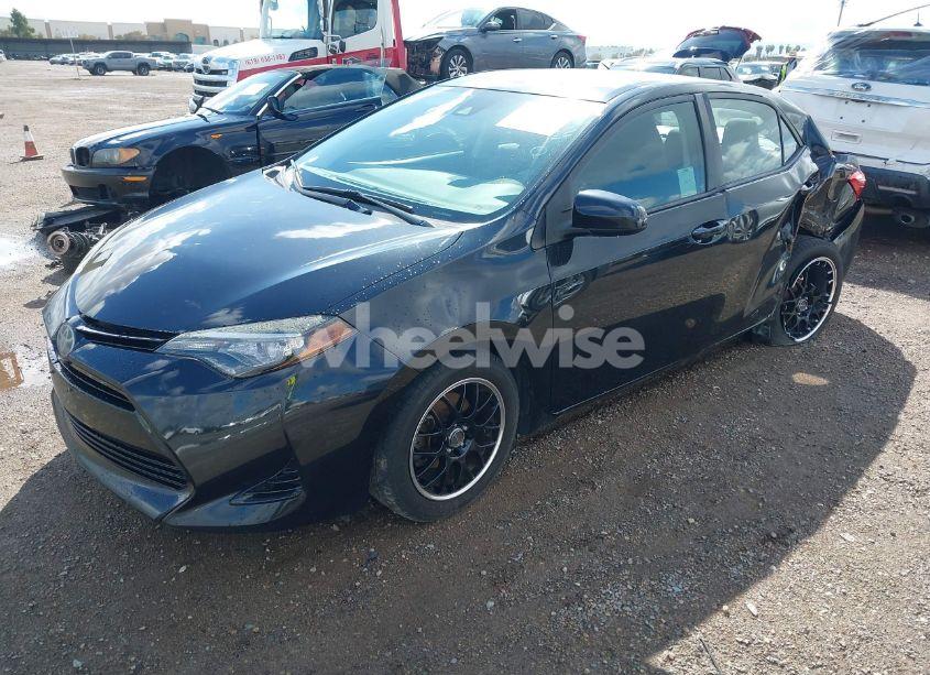 Photo 2 of 2017 Toyota Corolla LE (VIN 2T1BURHE0HC815883)