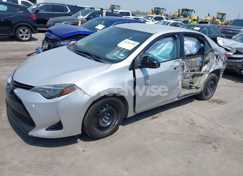 Photo 2 of 2017 Toyota Corolla LE (VIN 2T1BURHE0HC871127)