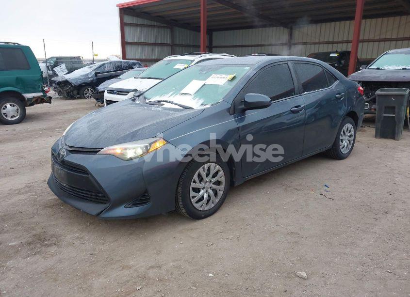 Photo 2 of 2017 Toyota Corolla LE (VIN 2T1BURHE0HC896111)