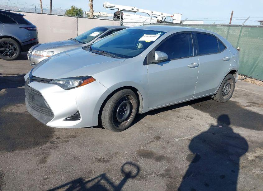 Photo 2 of 2017 Toyota Corolla LE (VIN 2T1BURHE0HC927597)