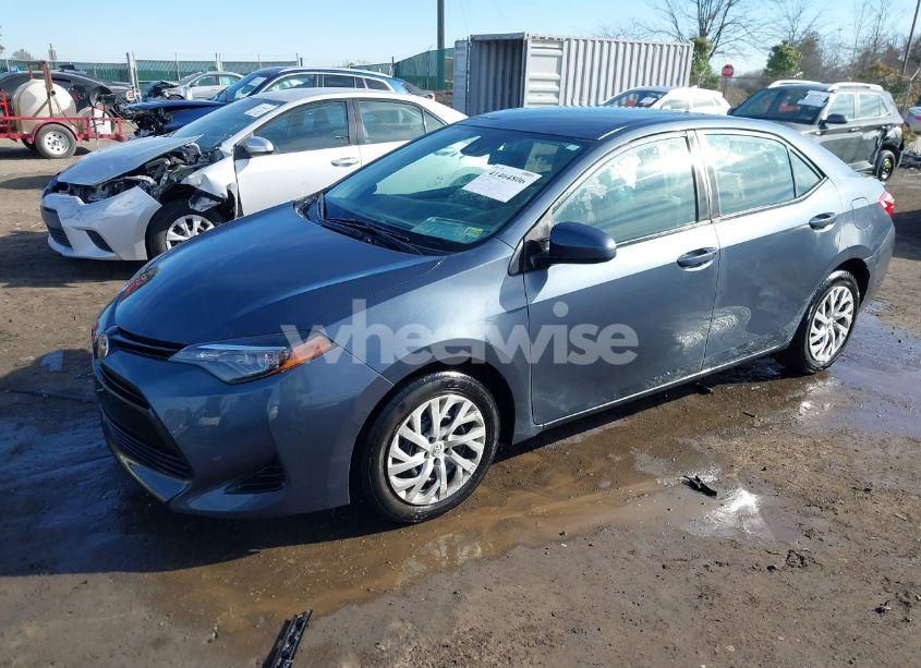 Photo 2 of 2017 Toyota Corolla LE (VIN 2T1BURHE0HC943279)