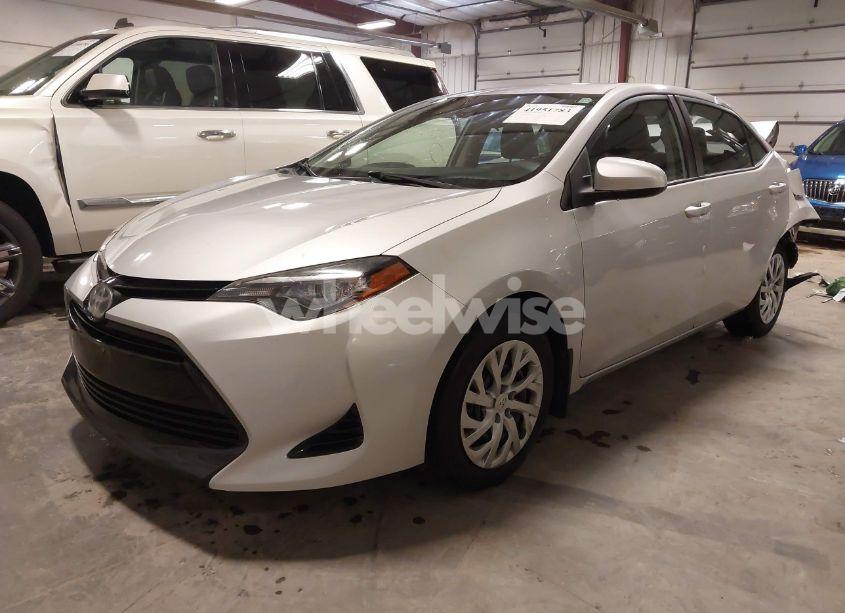 Photo 2 of 2017 Toyota Corolla LE (VIN 2T1BURHE1HC812619)