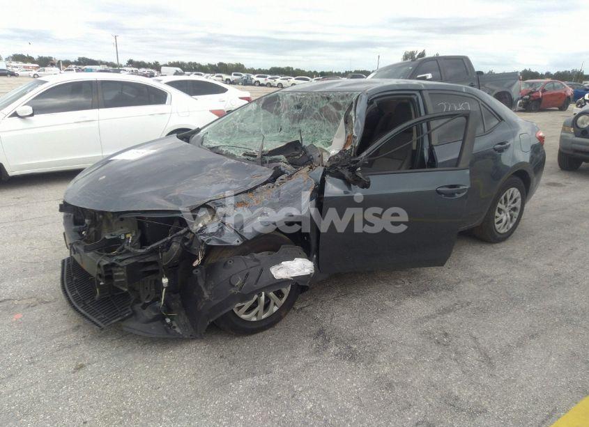 Photo 2 of 2017 Toyota Corolla LE (VIN 2T1BURHE1HC844888)