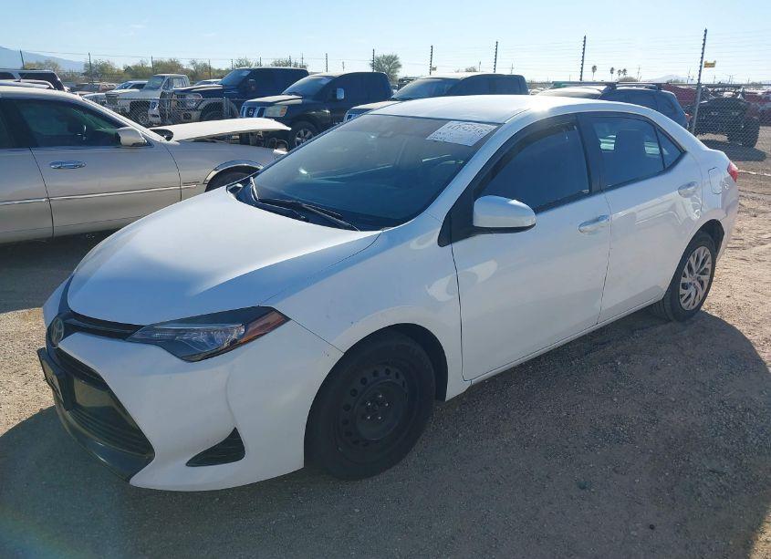 Photo 2 of 2017 Toyota Corolla LE (VIN 2T1BURHE2HC747506)