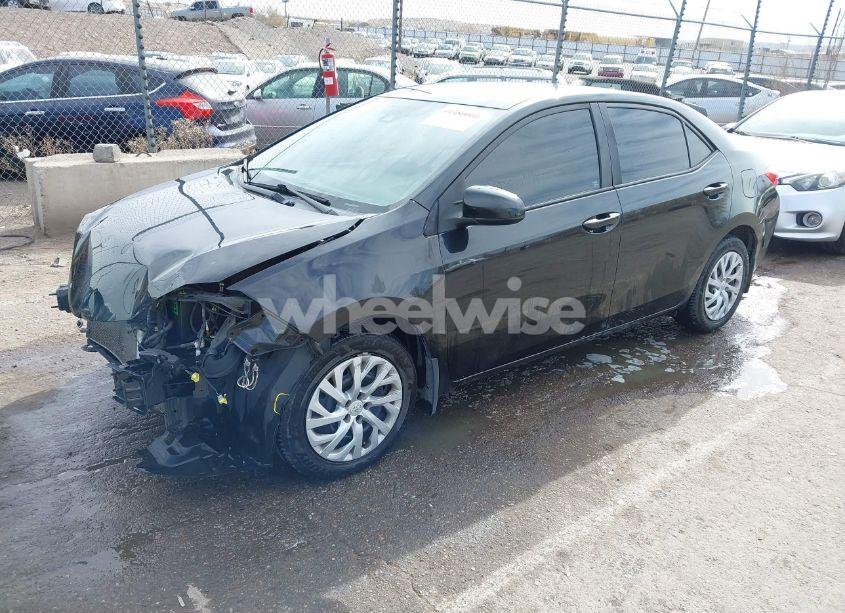 Photo 2 of 2017 Toyota Corolla LE (VIN 2T1BURHE2HC772597)