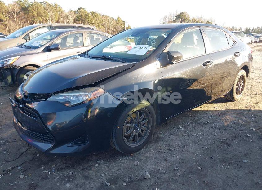 Photo 2 of 2017 Toyota Corolla LE (VIN 2T1BURHE2HC788203)