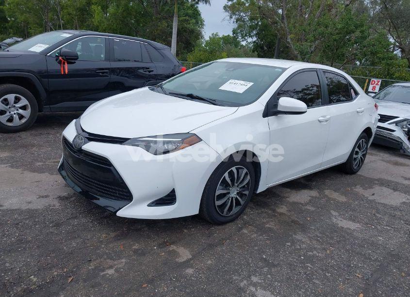 Photo 2 of 2017 Toyota Corolla LE (VIN 2T1BURHE2HC811835)