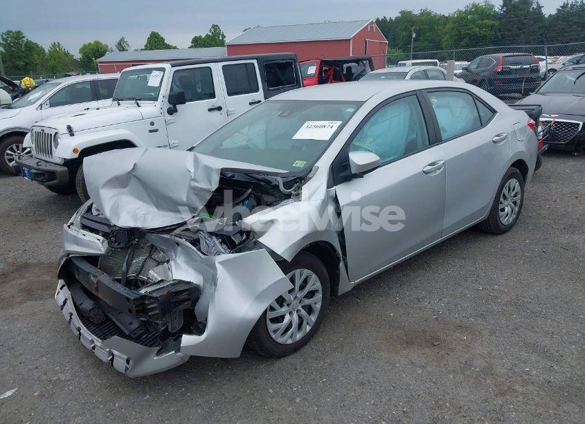 Photo 2 of 2017 Toyota Corolla LE (VIN 2T1BURHE2HC893579)