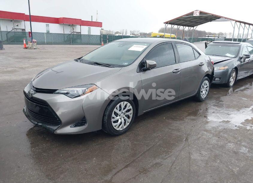 Photo 2 of 2017 Toyota Corolla LE (VIN 2T1BURHE2HC909022)