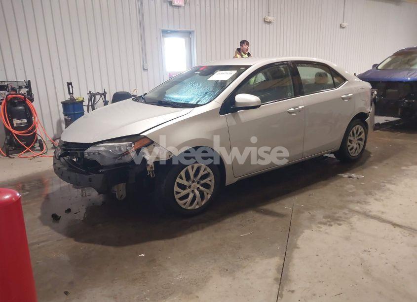 Photo 2 of 2017 Toyota Corolla LE (VIN 2T1BURHE2HC911644)