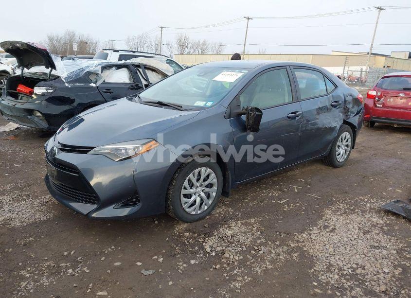 Photo 2 of 2017 Toyota Corolla LE (VIN 2T1BURHE2HC963307)