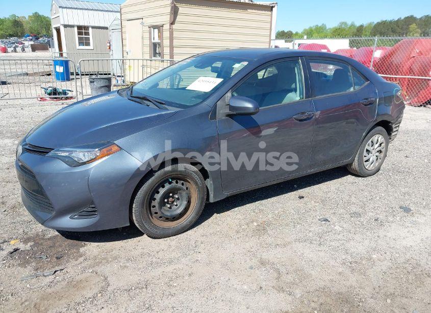 Photo 2 of 2017 Toyota Corolla LE (VIN 2T1BURHE4HC777588)
