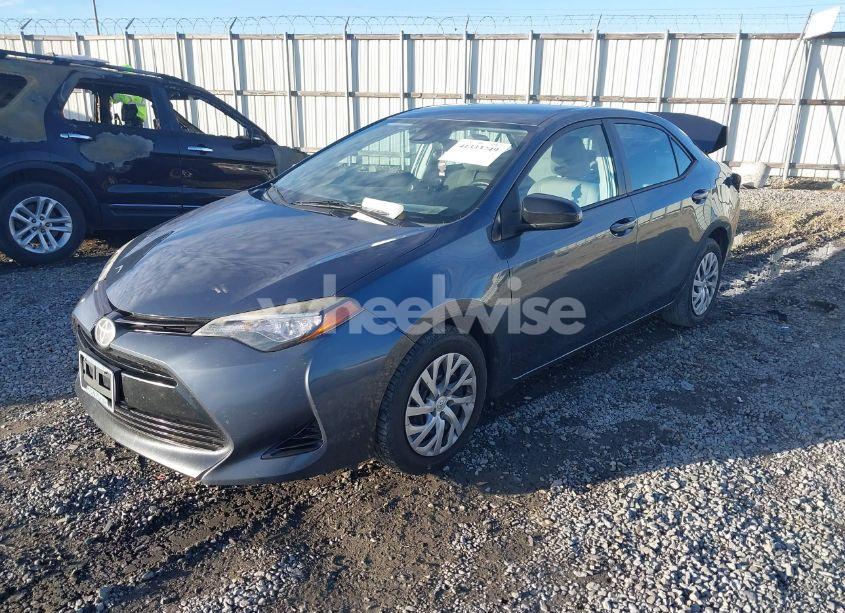 Photo 2 of 2017 Toyota Corolla LE (VIN 2T1BURHE4HC793967)