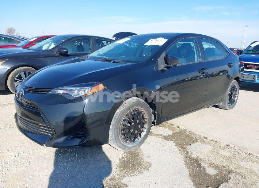 Photo 2 of 2017 Toyota Corolla LE (VIN 2T1BURHE4HC944340)