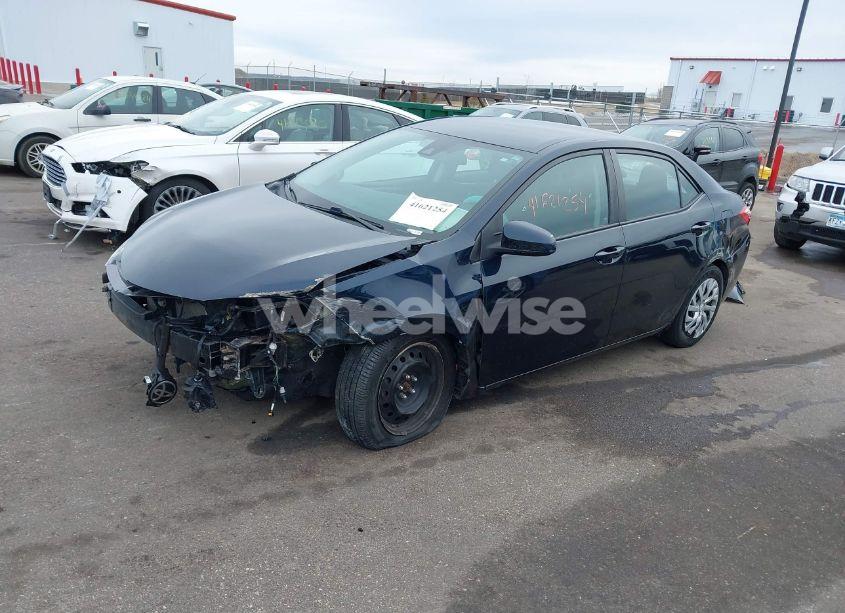 Photo 2 of 2017 Toyota Corolla LE (VIN 2T1BURHE4HC948405)