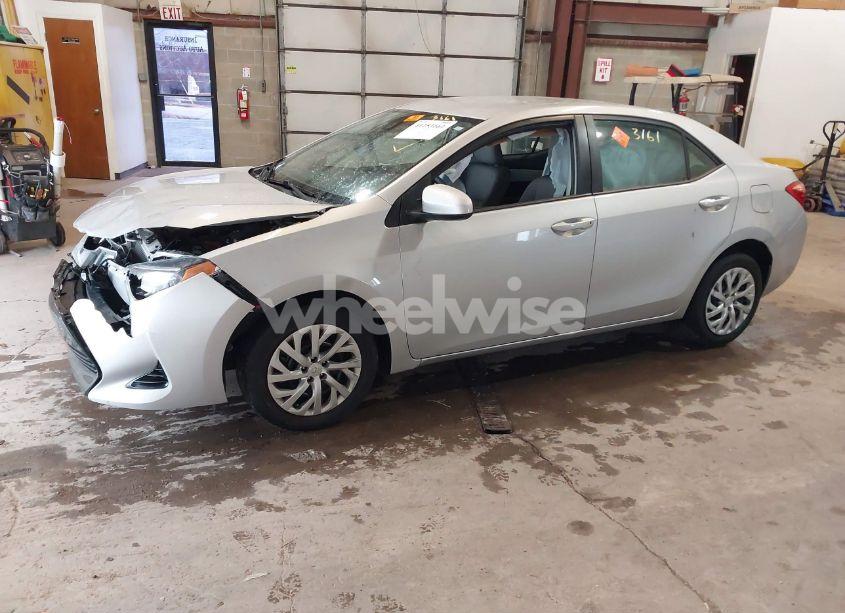 Photo 2 of 2017 Toyota Corolla LE (VIN 2T1BURHE4HC957900)