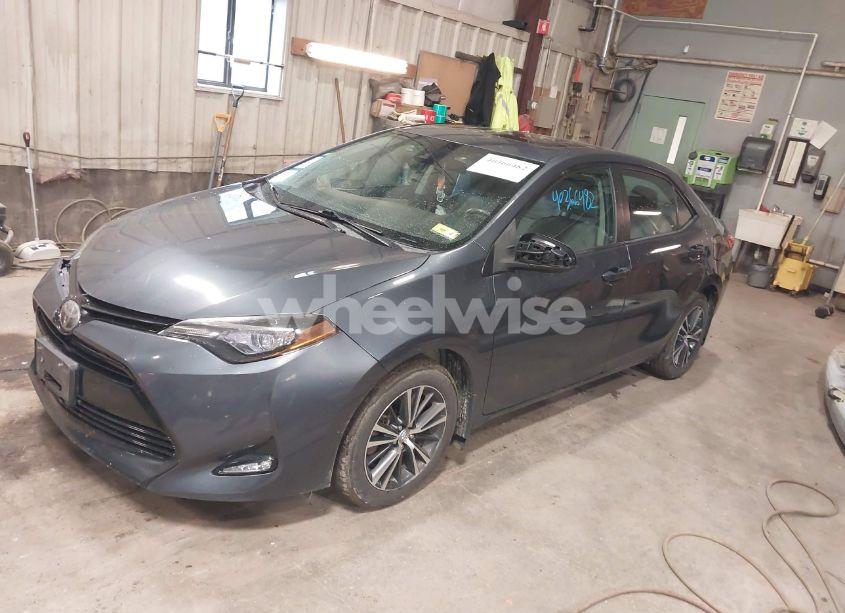 Photo 2 of 2017 Toyota Corolla LE (VIN 2T1BURHE5HC827589)