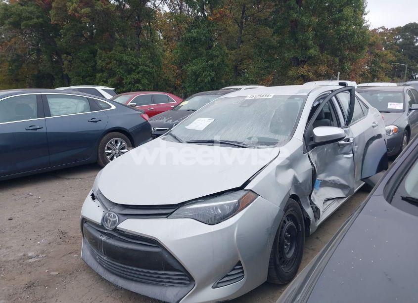 Photo 2 of 2017 Toyota Corolla LE (VIN 2T1BURHE6HC844501)