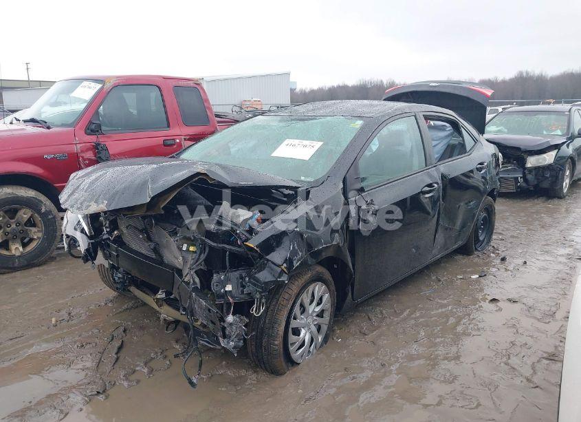 Photo 2 of 2017 Toyota Corolla LE (VIN 2T1BURHE6HC940130)