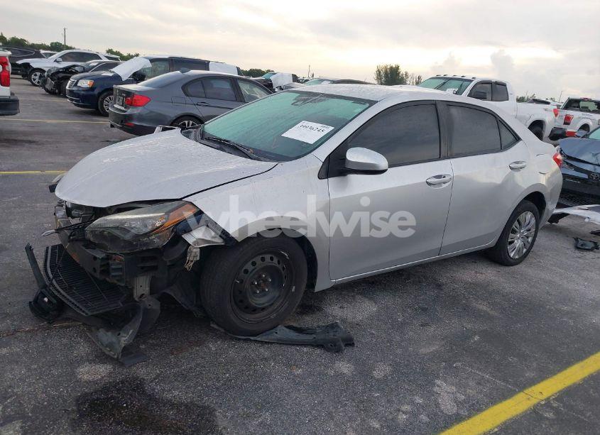 Photo 2 of 2017 Toyota Corolla LE (VIN 2T1BURHE7HC751907)