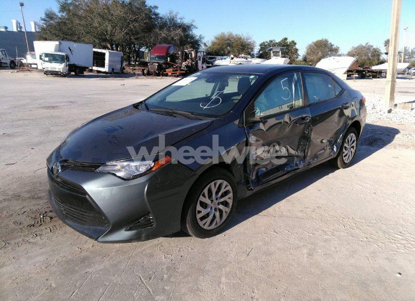 Photo 2 of 2017 Toyota Corolla LE (VIN 2T1BURHE7HC855412)