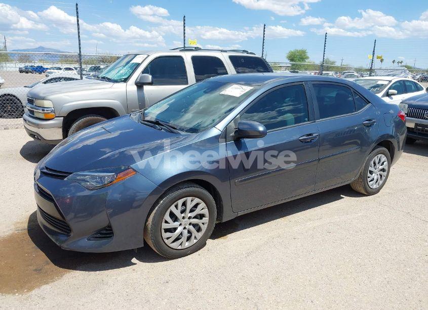 Photo 2 of 2017 Toyota Corolla LE (VIN 2T1BURHE7HC950343)