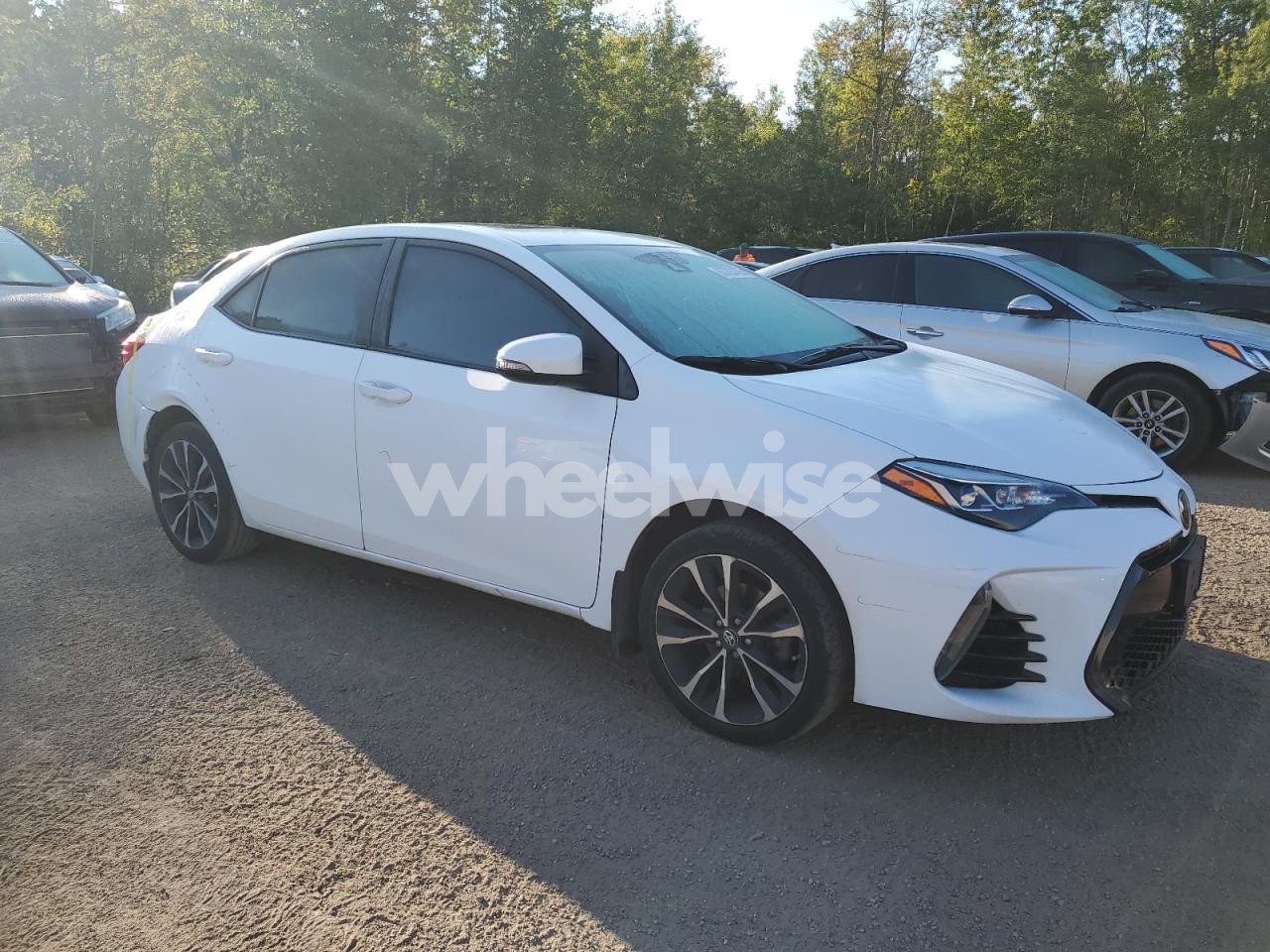 Photo 4 of 2018 TOYOTA COROLLA L (VIN 2T1BURHE7JC106437)