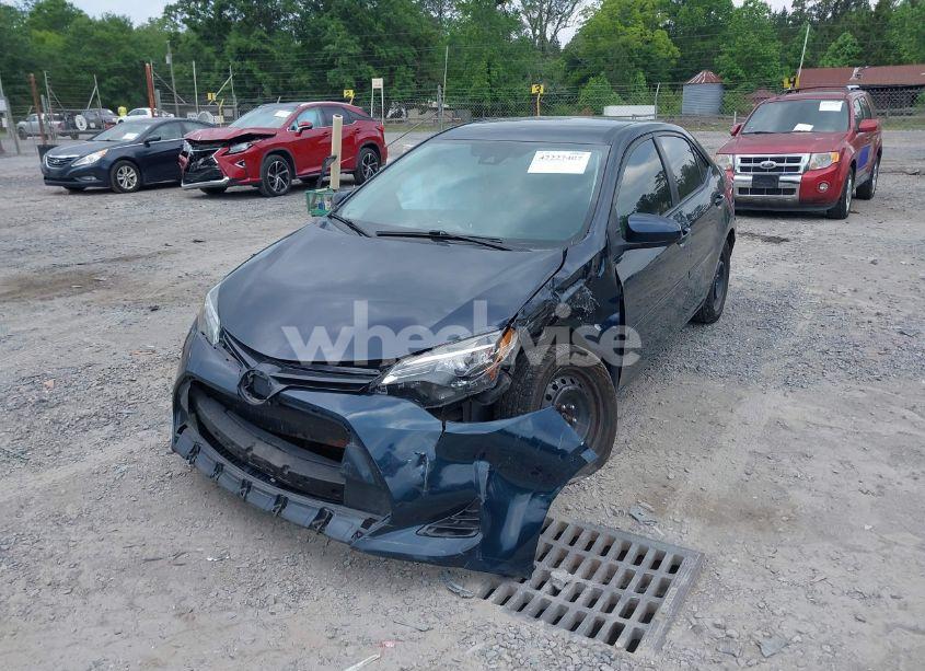 Photo 2 of 2017 Toyota Corolla LE (VIN 2T1BURHE8HC780137)