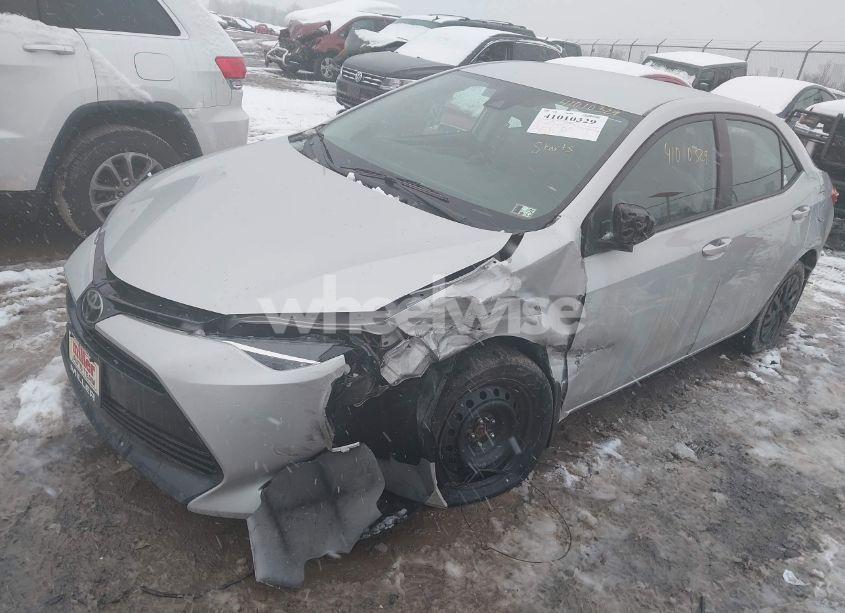 Photo 2 of 2017 Toyota Corolla LE (VIN 2T1BURHE8HC788495)