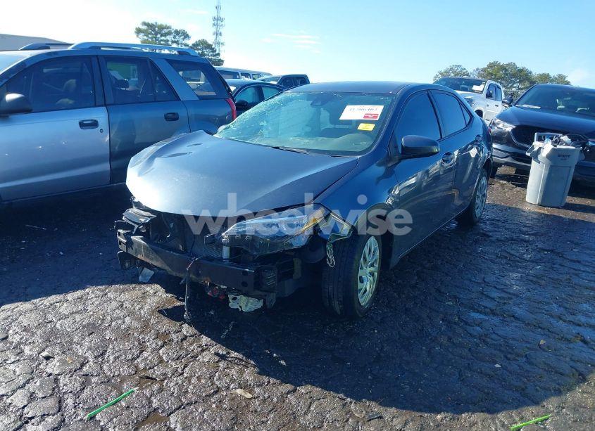 Photo 2 of 2017 Toyota Corolla LE (VIN 2T1BURHE8HC875619)