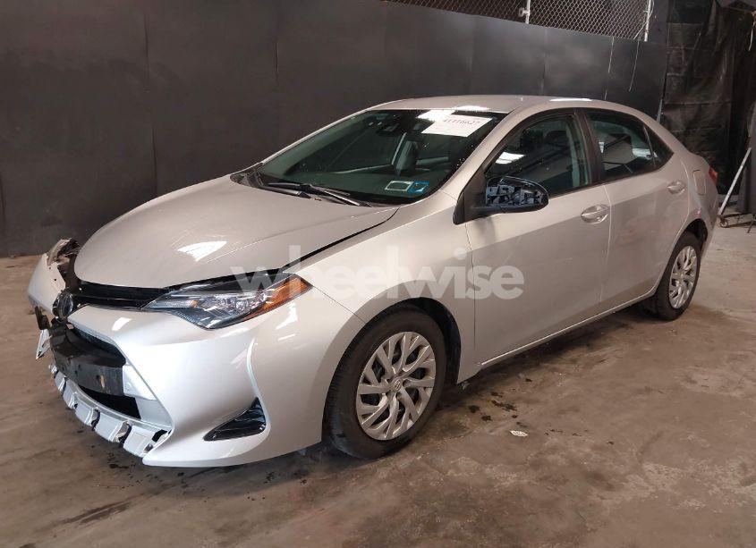 Photo 2 of 2017 Toyota Corolla LE (VIN 2T1BURHE9HC767249)