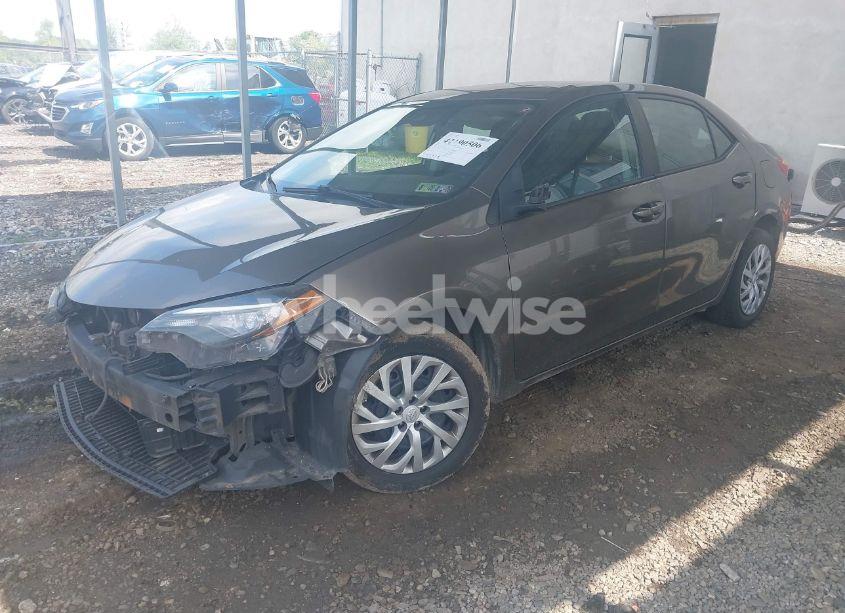 Photo 2 of 2017 Toyota Corolla LE (VIN 2T1BURHE9HC775450)