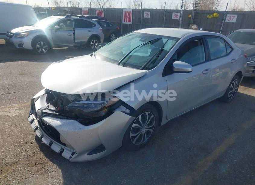 Photo 2 of 2017 Toyota Corolla LE (VIN 2T1BURHE9HC927436)
