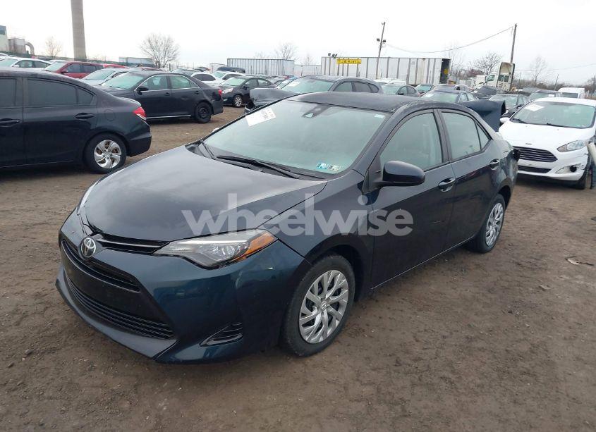 Photo 2 of 2017 Toyota Corolla LE (VIN 2T1BURHE9HC954121)