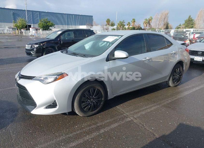 Photo 2 of 2017 Toyota Corolla L (VIN 2T1BURHE9HC959996)