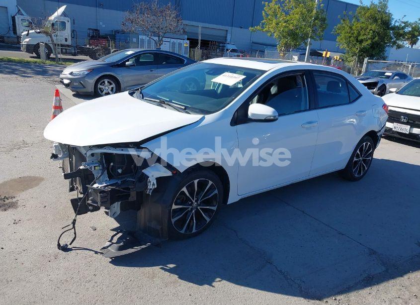 Photo 2 of 2019 Toyota Corolla (VIN 2T1BURHE9KC200773)