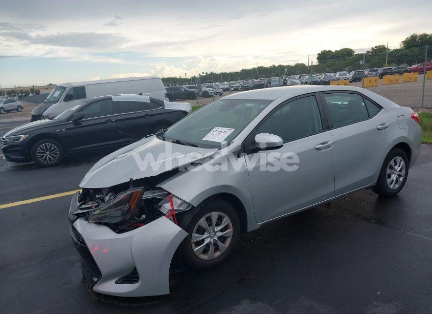 Photo 2 of 2017 Toyota Corolla L (VIN 2T1BURHEXHC779801)