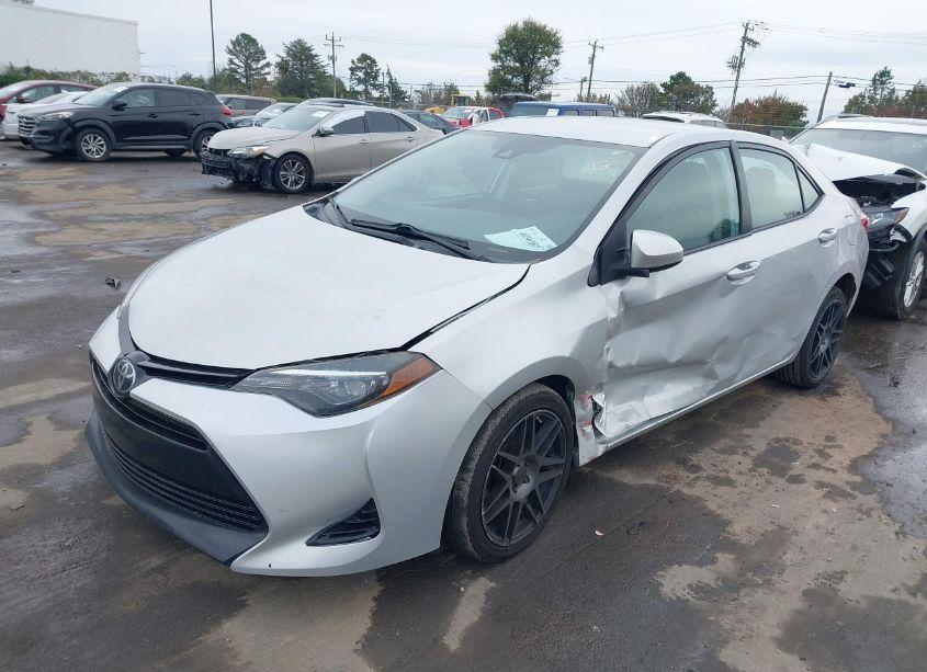 Photo 2 of 2017 Toyota Corolla LE (VIN 2T1BURHEXHC897413)