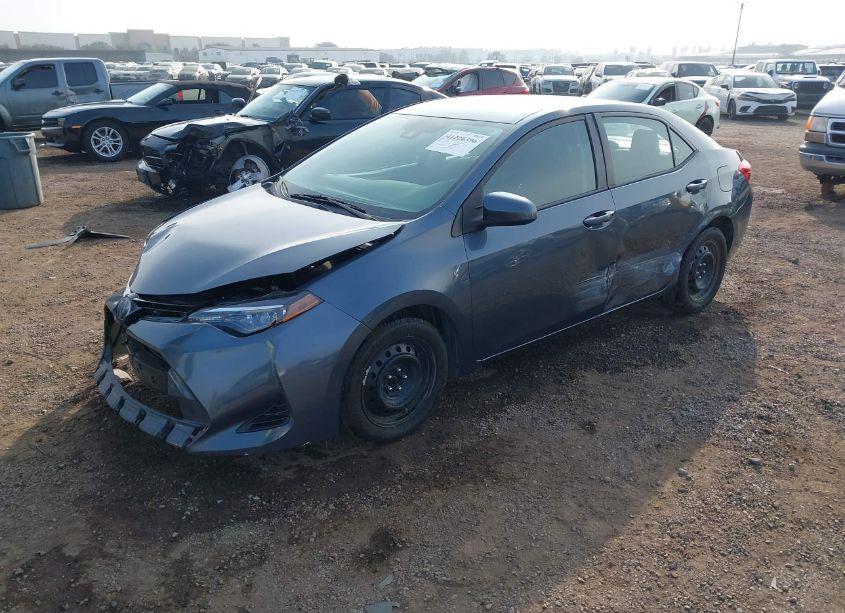 Photo 2 of 2017 Toyota Corolla LE (VIN 2T1BURHEXHC927610)